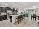 Modern kitchen with stainless steel appliances and granite countertops at 4738 Terrasonesta Dr, Davenport, FL 33837