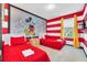 Mickey Mouse themed bedroom with two twin beds at 4738 Terrasonesta Dr, Davenport, FL 33837