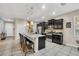 Modern kitchen with stainless steel appliances and granite countertops at 4738 Terrasonesta Dr, Davenport, FL 33837