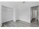 Spacious bedroom with grey flooring and closet at 161 Marion Oaks Trail, Ocala, FL 34473