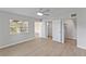 Bedroom with wood-look floors, en-suite bathroom, and walk-in closet at 2140 Ridge Dr, Winter Park, FL 32792