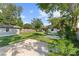 Large backyard with patio and storage shed at 2140 Ridge Dr, Winter Park, FL 32792