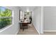 Home office with a window and built-in shelves at 2140 Ridge Dr, Winter Park, FL 32792