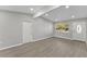 Spacious living room with neutral walls and wood-look flooring at 2140 Ridge Dr, Winter Park, FL 32792