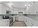Newly remodeled kitchen featuring white shaker cabinets and subway tile backsplash at 2140 Ridge Dr, Winter Park, FL 32792