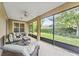 Relaxing screened porch overlooking the backyard at 1381 Hazeldene Mnr, Deland, FL 32724