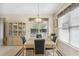 Charming dining area with a table and built-in hutch at 1381 Hazeldene Mnr, Deland, FL 32724