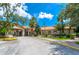 Community entrance with fountain and landscaping at 8091 Brooksville Dr, Davenport, FL 33896
