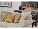 Living room with comfy couch and throw pillows at 8091 Brooksville Dr, Davenport, FL 33896
