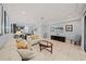 Spacious living area with ample natural light and views to the kitchen and dining area at 8091 Brooksville Dr, Davenport, FL 33896