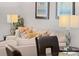 Living room with light beige couch and decor at 8091 Brooksville Dr, Davenport, FL 33896