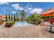 Resort-style pool with ample seating and shade at 8091 Brooksville Dr, Davenport, FL 33896