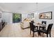 Bright living room with access to a private patio at 8091 Brooksville Dr, Davenport, FL 33896