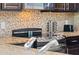 Modern kitchen with granite countertops and stainless steel appliances at 8091 Brooksville Dr, Davenport, FL 33896