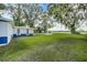 Spacious backyard with grassy area and large trees at 313 Story Partin Rd, Orlando, FL 32833