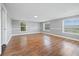 Open living room with hardwood floors and ample natural light at 313 Story Partin Rd, Orlando, FL 32833