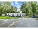 Cute blue house with a spacious yard at 313 Story Partin Rd, Orlando, FL 32833