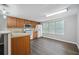 Efficient kitchen with wood cabinets and modern appliances at 313 Story Partin Rd, Orlando, FL 32833