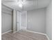 Bright bedroom with ceiling fan and large closet at 313 Story Partin Rd, Orlando, FL 32833