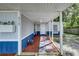 Inviting exterior with a covered walkway and a stone path leading to the entrance at 313 Story Partin Rd, Orlando, FL 32833