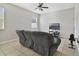 Relaxing living room with two recliners and a large TV at 1209 Seburn Rd, Apopka, FL 32703