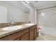 Main bathroom with double sinks and a shower/tub combo at 1209 Seburn Rd, Apopka, FL 32703