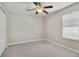 Bedroom with ceiling fan, neutral walls, and carpet flooring at 1209 Seburn Rd, Apopka, FL 32703