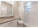 Clean bathroom with white tile shower and granite countertop at 709 Del Rio Way, Kissimmee, FL 34758