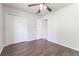 Spacious bedroom featuring wood-look floors and a large closet at 709 Del Rio Way, Kissimmee, FL 34758