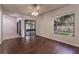 Bright dining room with wood floors, sliding glass doors to patio, and view of backyard at 709 Del Rio Way, Kissimmee, FL 34758