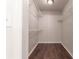 Large walk-in closet with wire shelving and wood flooring at 709 Del Rio Way, Kissimmee, FL 34758