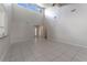 Spacious living room featuring high ceilings and tile flooring at 709 Del Rio Way, Kissimmee, FL 34758