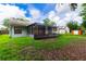 Large backyard with screened porch and shed at 709 Del Rio Way, Kissimmee, FL 34758