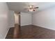 Bright bedroom with wood flooring and access to hallway at 709 Del Rio Way, Kissimmee, FL 34758