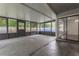 Spacious screened porch with concrete flooring and access to the backyard at 709 Del Rio Way, Kissimmee, FL 34758