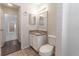 Simple bathroom with granite vanity and tiled shower at 709 Del Rio Way, Kissimmee, FL 34758
