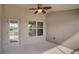 Relaxing screened porch with tiled floor and access to backyard at 4070 Island Lakes Dr, Winter Haven, FL 33881