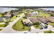 Aerial view of home near lake and community at 4070 Island Lakes Dr, Winter Haven, FL 33881