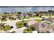 Aerial view of the property and waterfront community at 4070 Island Lakes Dr, Winter Haven, FL 33881