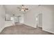 Spacious living room with carpet and ceiling fan at 4070 Island Lakes Dr, Winter Haven, FL 33881