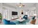 Living room with a neutral color scheme and ceiling fan at 4070 Island Lakes Dr, Winter Haven, FL 33881