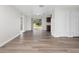 Living room with wood-look floors and sliding glass doors at 5400 Fox Briar Trl, Orlando, FL 32808