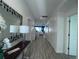 Bright and spacious hallway with tile flooring and elegant decor at 2621 Calistoga Ave, Kissimmee, FL 34741