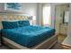 Bedroom with a king-size bed and ensuite bathroom at 2621 Calistoga Ave, Kissimmee, FL 34741