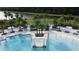 Resort-style pool and spa with lush landscaping at 2621 Calistoga Ave, Kissimmee, FL 34741