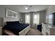 Primary bedroom with king-size bed and TV at 2621 Calistoga Ave, Kissimmee, FL 34741