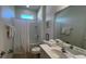Bathroom with a bathtub and shower at 2621 Calistoga Ave, Kissimmee, FL 34741