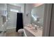 Clean bathroom with a bathtub and vanity at 2621 Calistoga Ave, Kissimmee, FL 34741