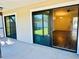 Sliding glass doors leading to a patio and backyard at 1050 Abell Cir, Oviedo, FL 32765