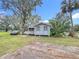 Charming house exterior with a spacious lawn at 1017 Mabbette St, Kissimmee, FL 34741